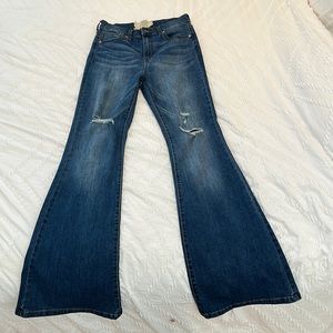 Dark washed flare jeans from Altar’d State